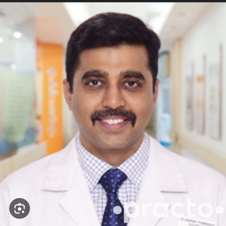 Dr. Adarsh T